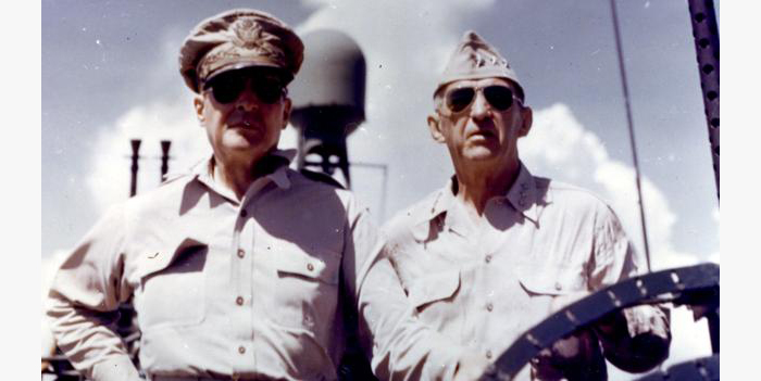 Low-angle view of American military commanders General Douglas MacArthur (1880 - 1964) (left) and Lieutenant General Walter Krueger (1881 - 1967) aboard a PT boat in the Leyte Gulf, Philippines, 1944. (Photo by PhotoQuest/Getty Images)