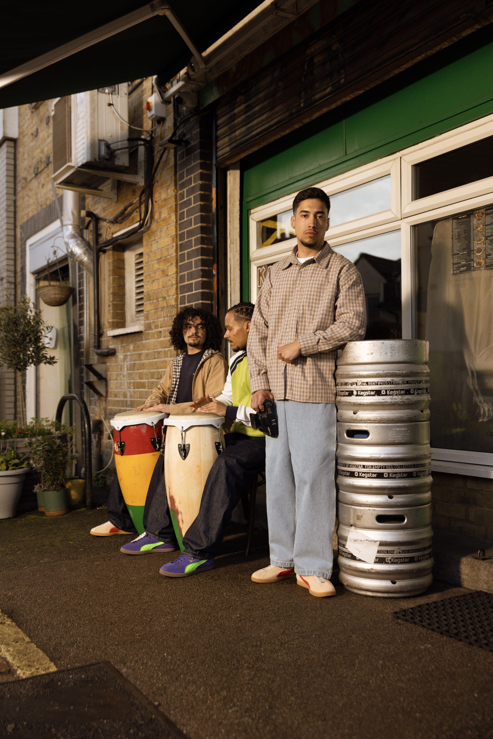 People wearing PUMA Brasil - size? exclusive outside restaurant